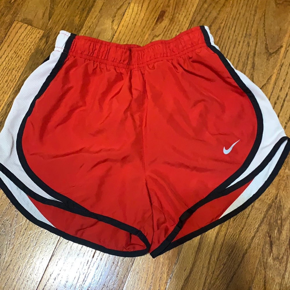 red nike shorts